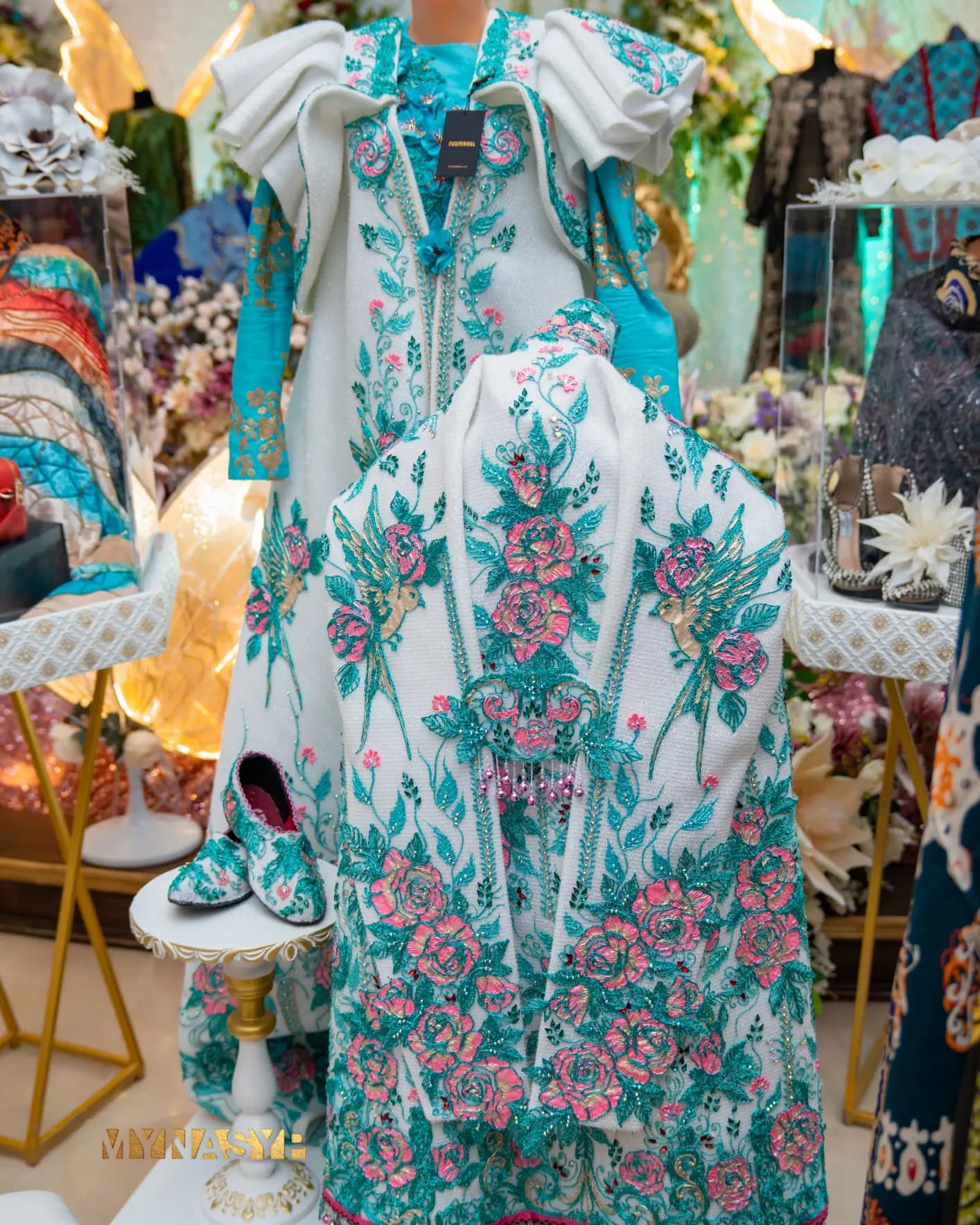 women's bridal wear — product by Мынасып Дом Моды